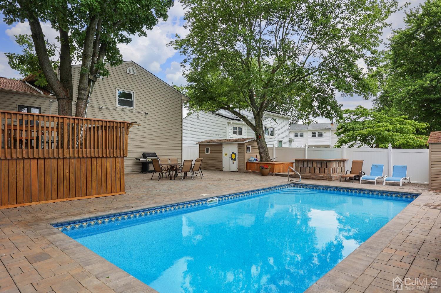 10 Gramercy Road Old Bridge, NJ 08857 - Photo 8 of 31 a view of house with outdoor space and swimming pool