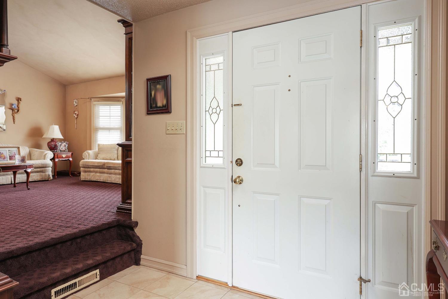 10 Gramercy Road Old Bridge, NJ 08857 - Photo 10 of 31 a living room with furniture and a gate