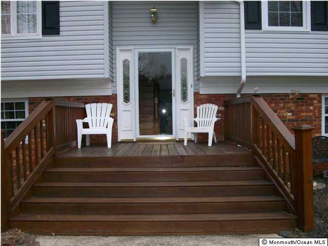 231 Georgia Road Freehold, NJ 07728 - Photo 2 of 3 a view of entryway with a front door