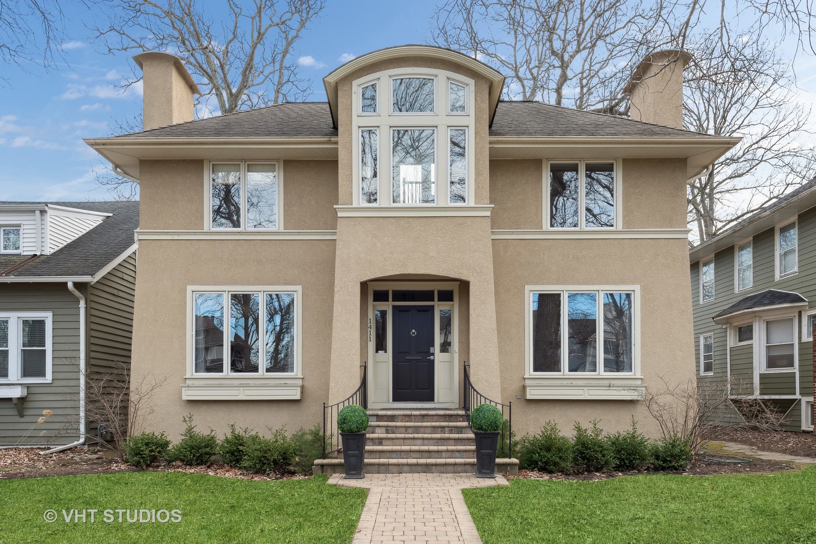 1411 Maple Avenue Wilmette, IL 60091 - Photo 1 of 41 a front view of a house
