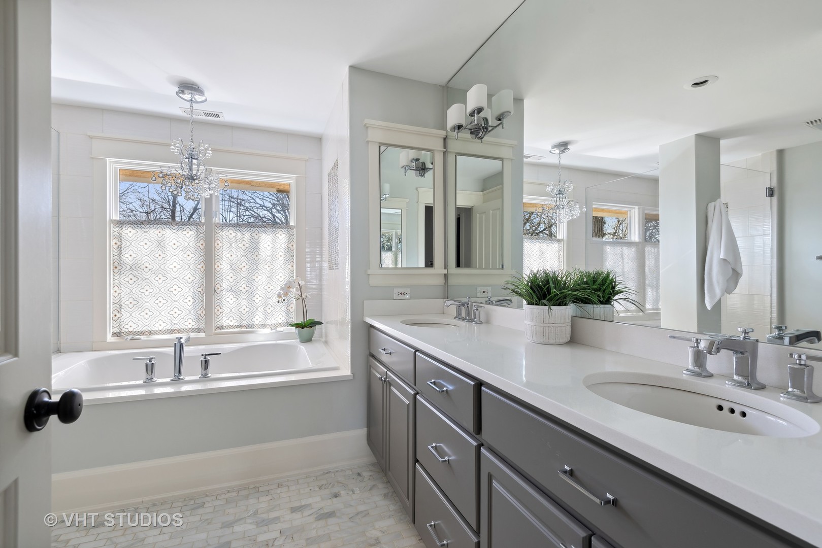 1411 Maple Avenue Wilmette, IL 60091 - Photo 14 of 41 a bathroom with a granite countertop sink mirror and a bathtub