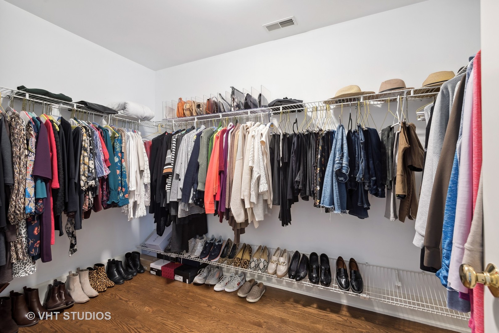 1411 Maple Avenue Wilmette, IL 60091 - Photo 16 of 41 a view of walk in closet with clothes and shoes