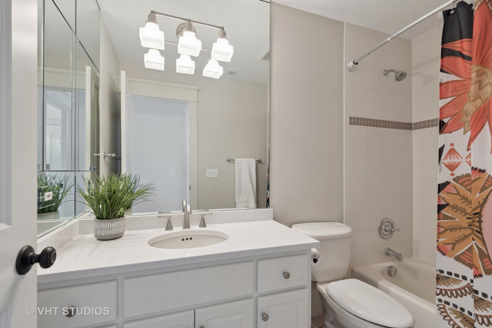 1411 Maple Avenue Wilmette, IL 60091 - Photo 21 of 41 a bathroom with a sink a toilet and shower