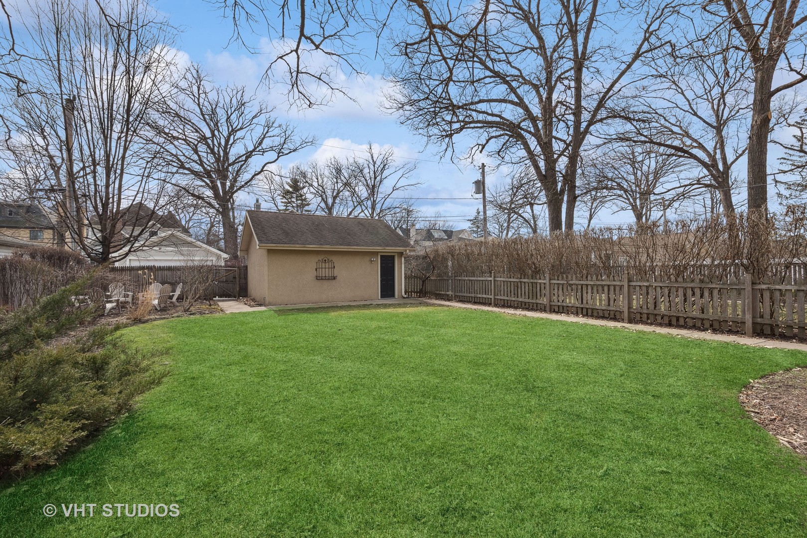 1411 Maple Avenue Wilmette, IL 60091 - Photo 29 of 41 a view of a backyard with large trees