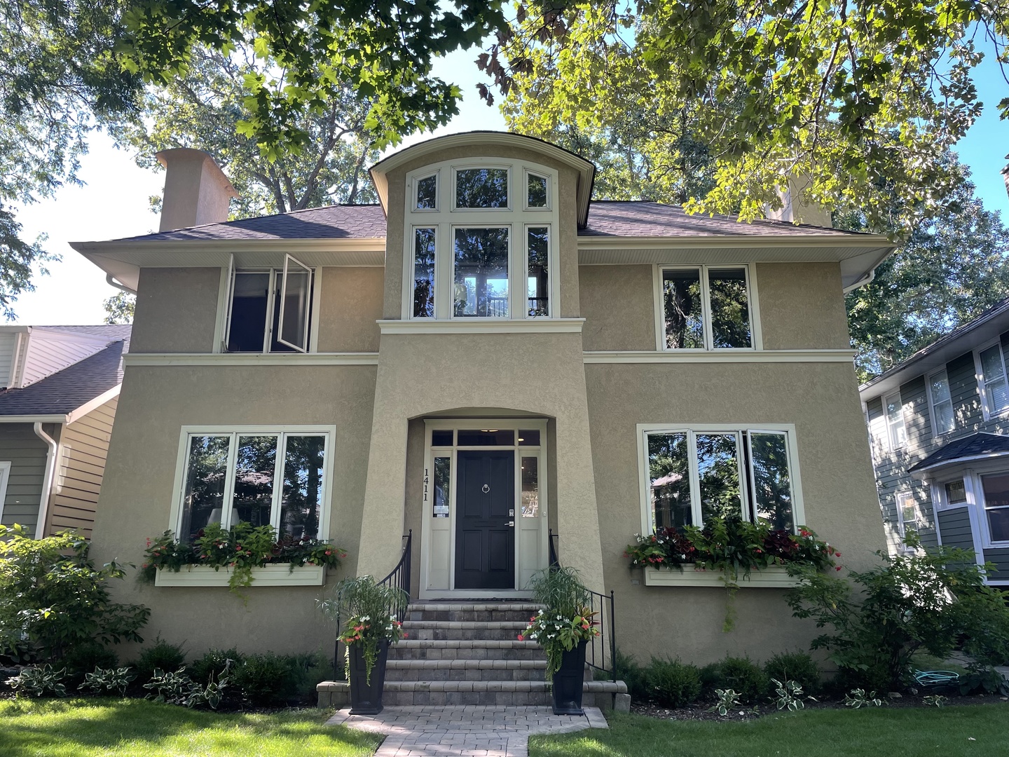 1411 Maple Avenue Wilmette, IL 60091 - Photo 35 of 41 front view of a house with a yard