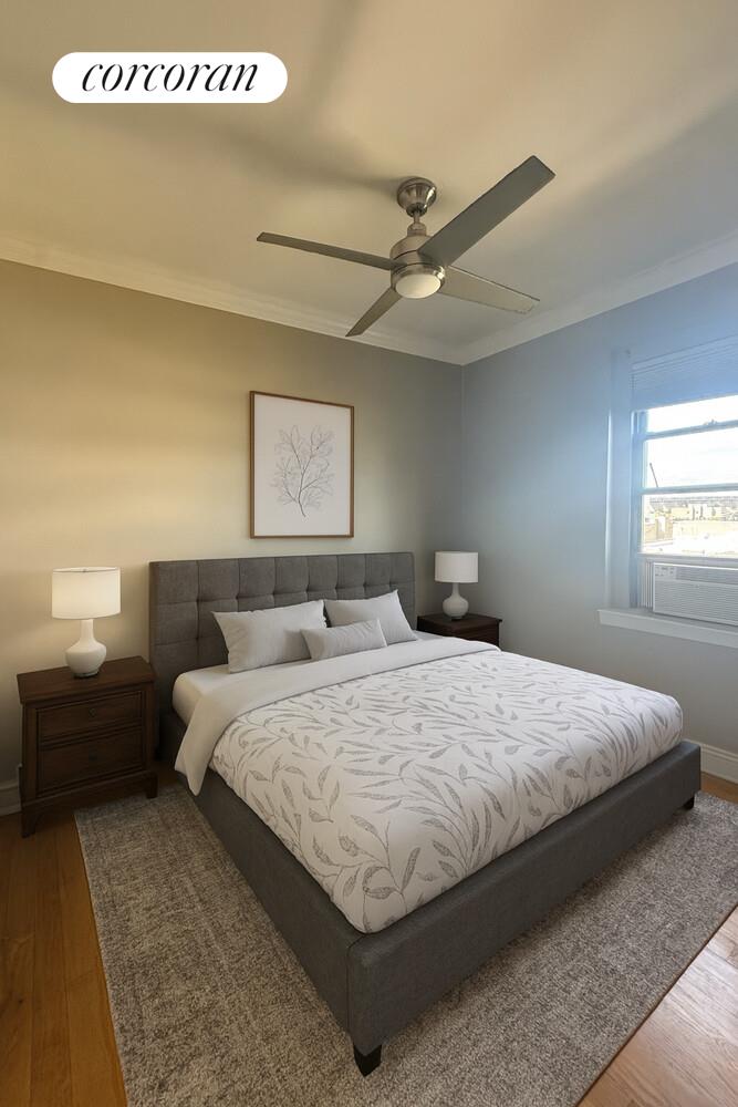 21-67 33rd Street, Unit 5E Queens, NY 11105 - Photo 2 of 4 a bedroom with a bed and window