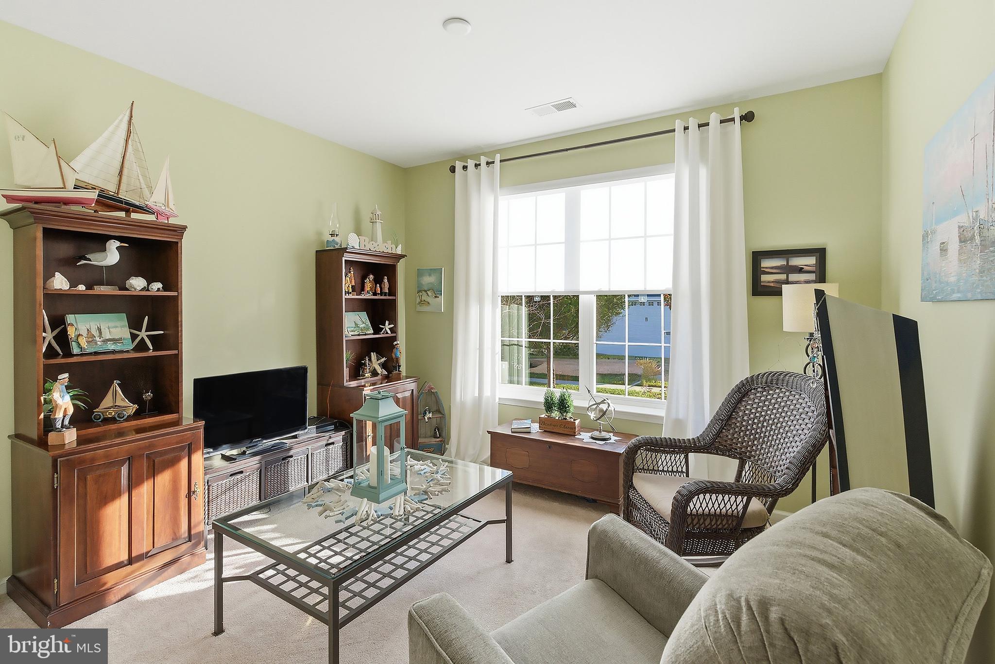 16 Raccoon Lane Barnegat, NJ 08005 - Photo 15 of 31 a living room with furniture and a flat screen tv
