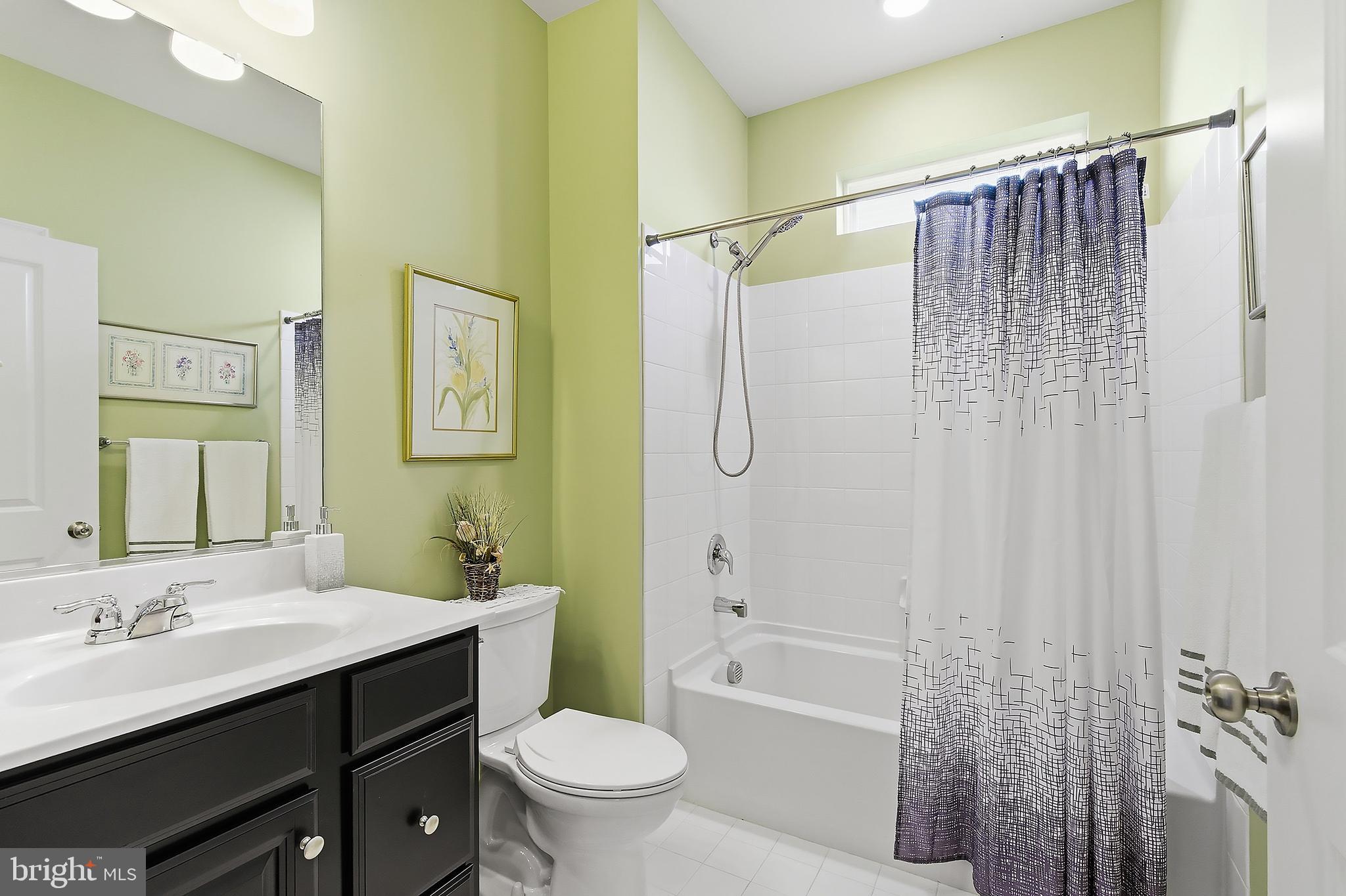 16 Raccoon Lane Barnegat, NJ 08005 - Photo 18 of 31 a bathroom with a sink a toilet and shower