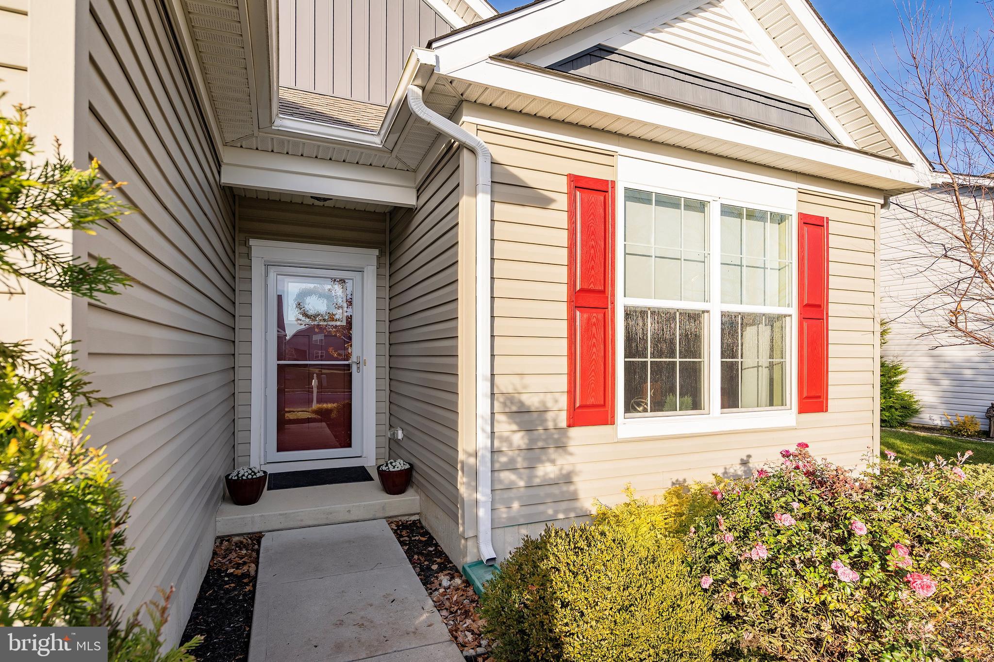16 Raccoon Lane Barnegat, NJ 08005 - Photo 2 of 31 a front view of a house with a yard