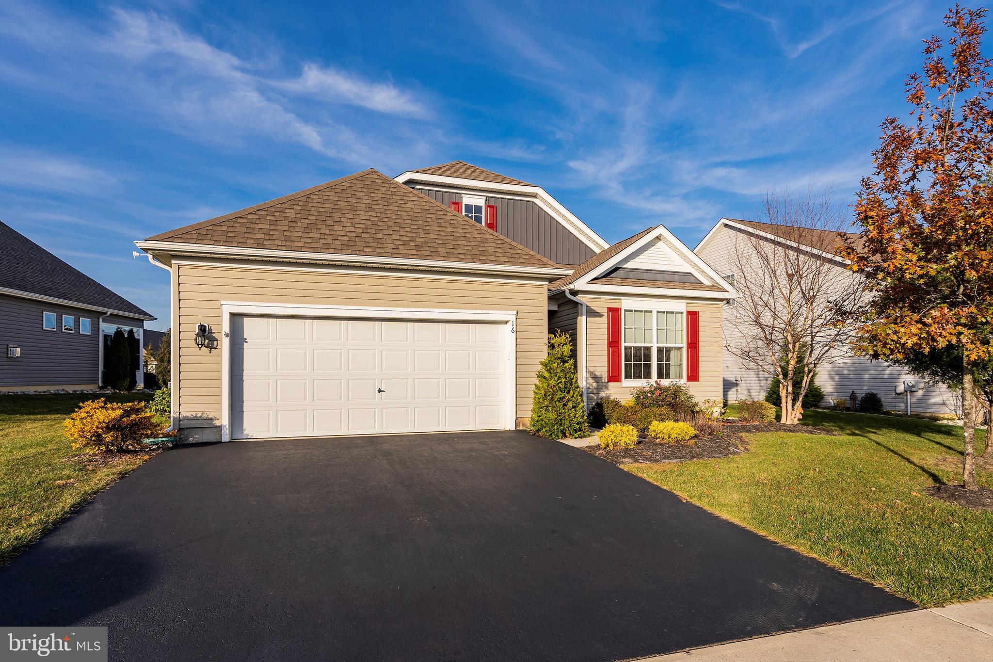 16 Raccoon Lane Barnegat, NJ 08005 - Photo 3 of 31 a front view of a house with a yard