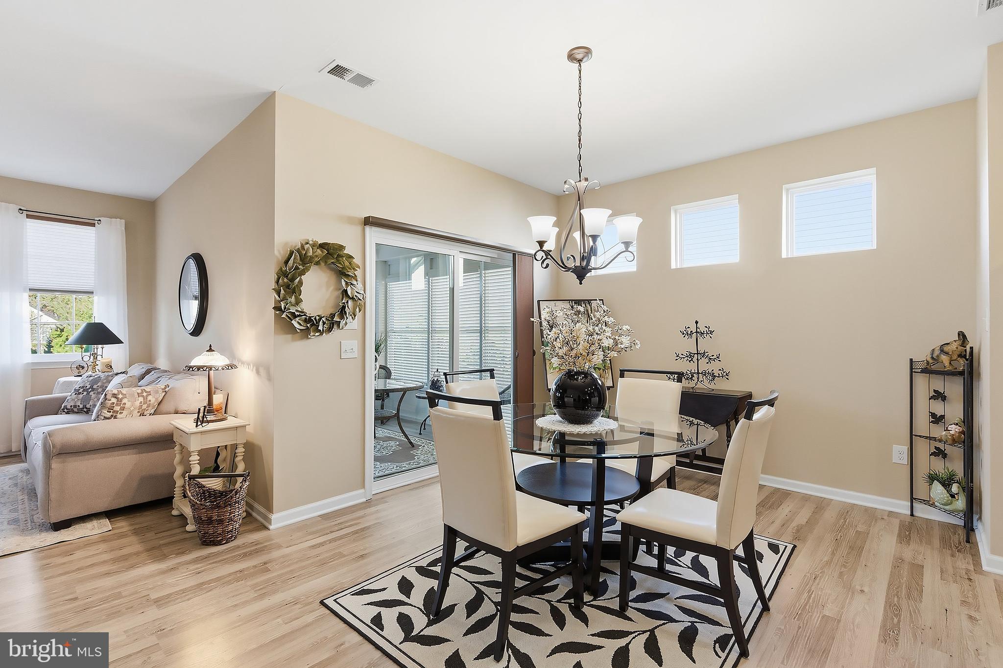 16 Raccoon Lane Barnegat, NJ 08005 - Photo 6 of 31 a view of a dining room with furniture window and wooden floor