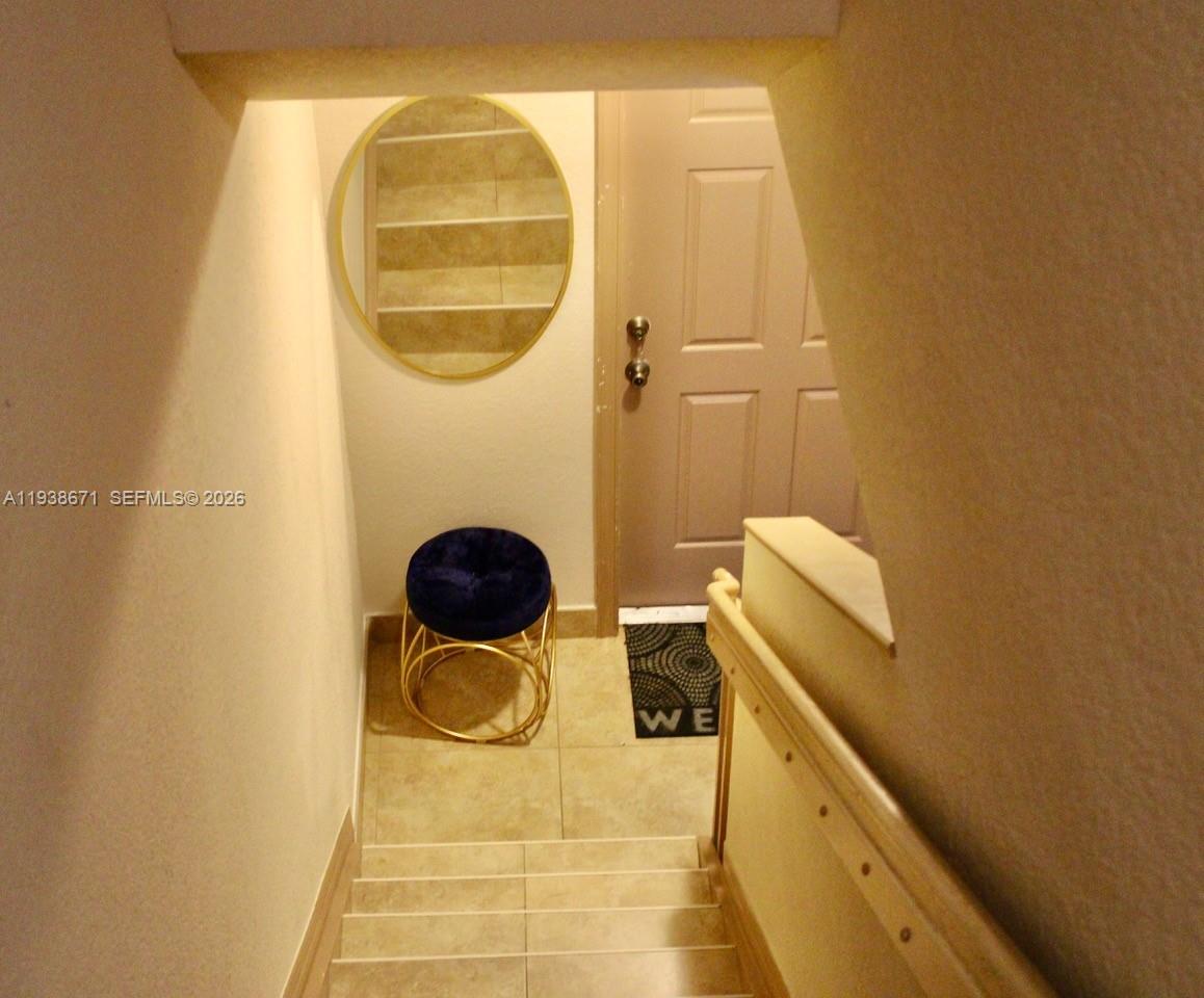 5954 Royal Way Tamarac, FL 33321 - Photo 15 of 28 a bathroom with a sink and a mirror