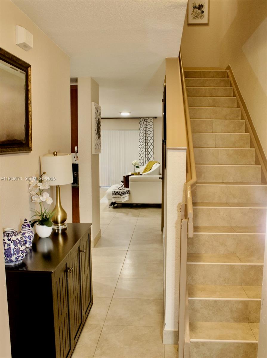 5954 Royal Way Tamarac, FL 33321 - Photo 16 of 28 a bathroom with a sink and a mirror