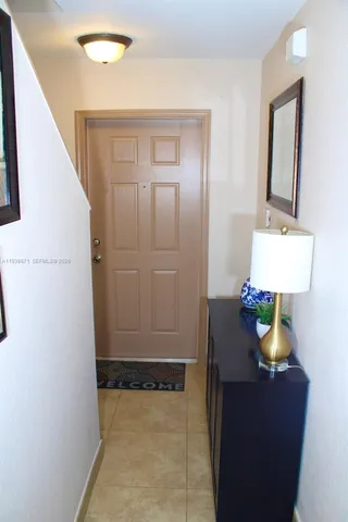 a work room with furniture and a window