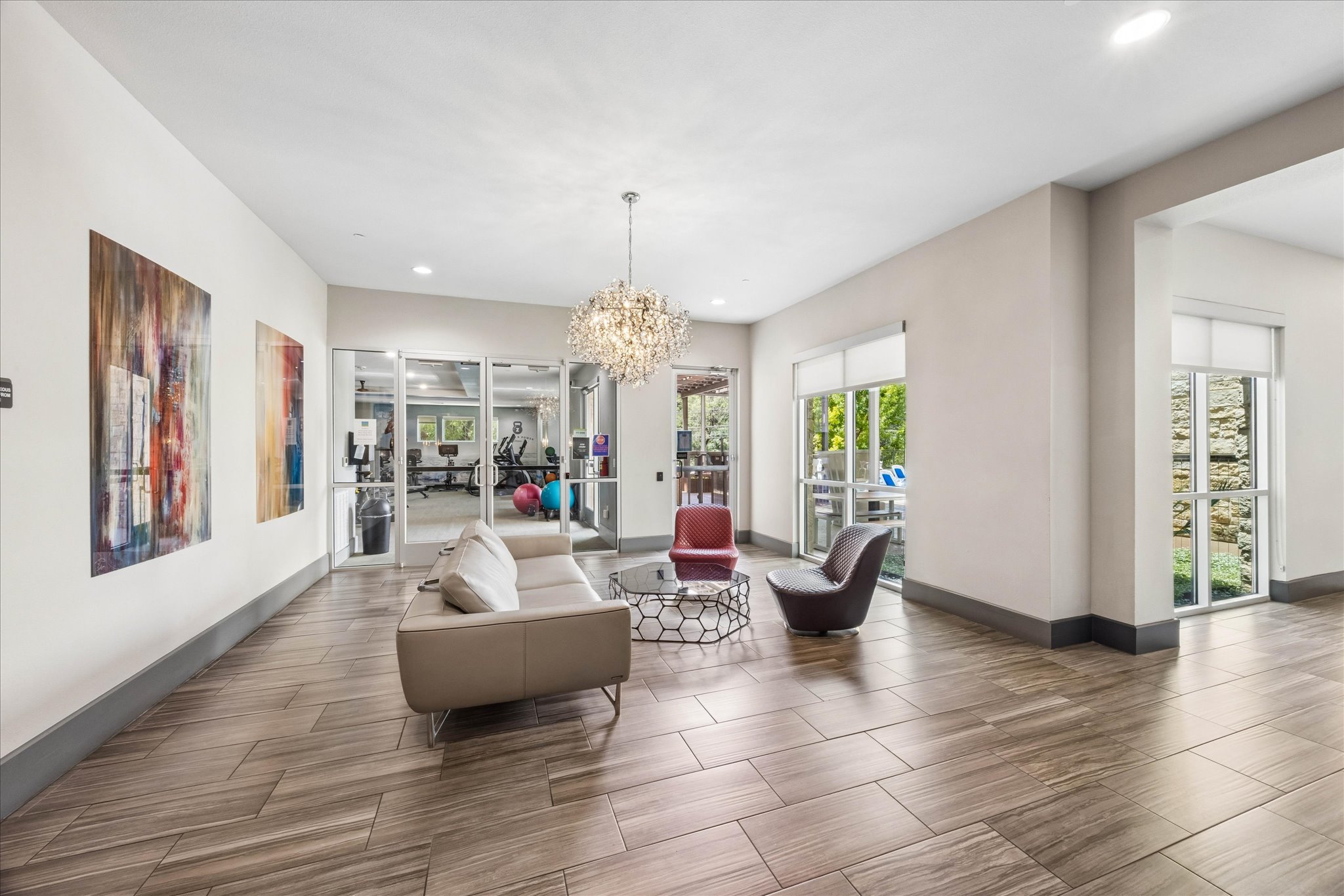 1900 Barton Springs Road, Unit 4041 Austin, TX 78704 - Photo 29 of 35 a living room with furniture and wooden floor