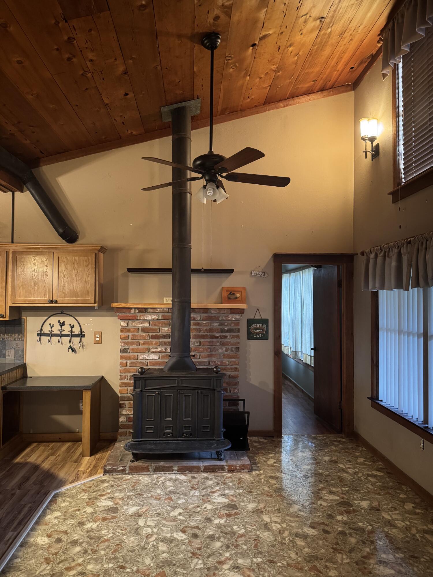 9636 Southwest Adams Avenue Okeechobee, FL 34974 - Photo 17 of 38 a view of a hall with wooden floor