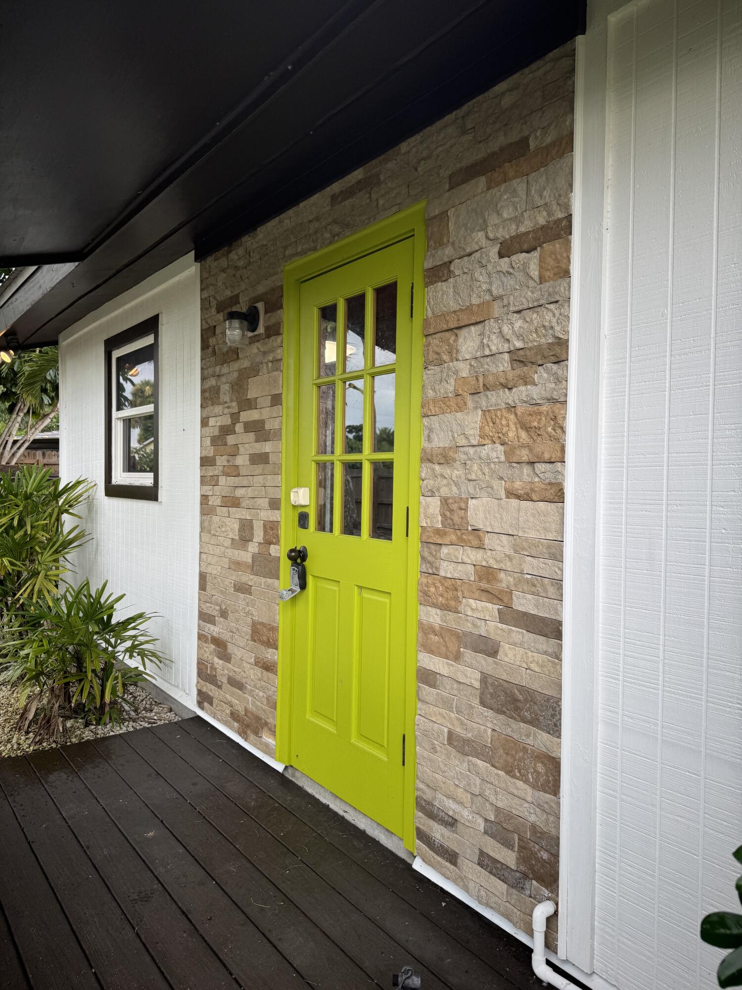 9636 Southwest Adams Avenue Okeechobee, FL 34974 - Photo 2 of 38 a view of front door of house with wooden floor