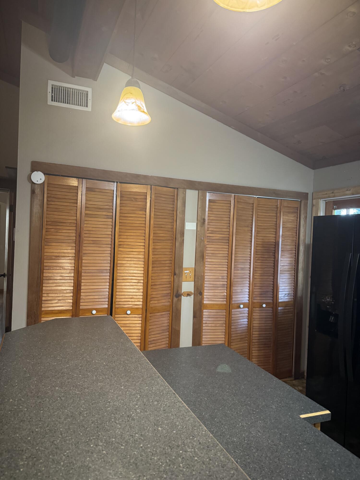 9636 Southwest Adams Avenue Okeechobee, FL 34974 - Photo 29 of 38 an empty room with windows