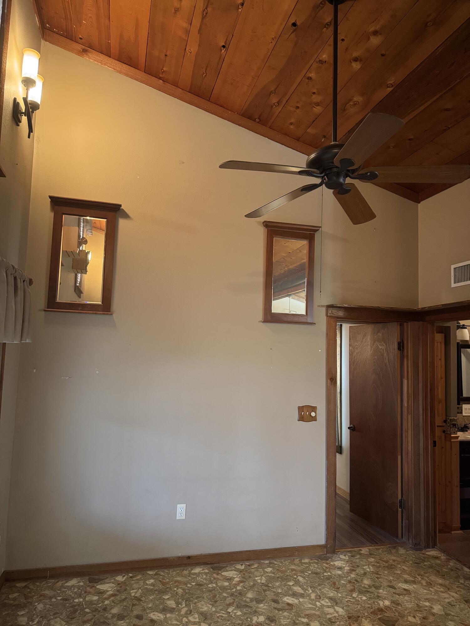 9636 Southwest Adams Avenue Okeechobee, FL 34974 - Photo 32 of 38 a view of a livingroom with a ceiling fan