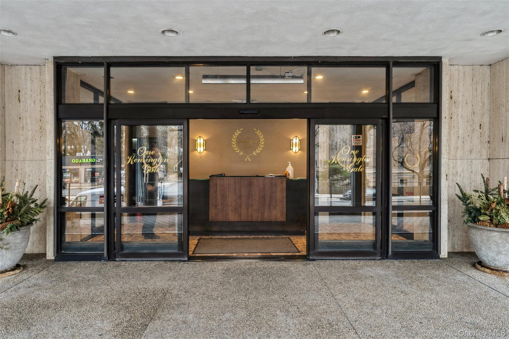 1 Kensington Gate, Unit PH9 Great Neck, NY 11021 - Photo 2 of 17 a view of front door with outdoor space