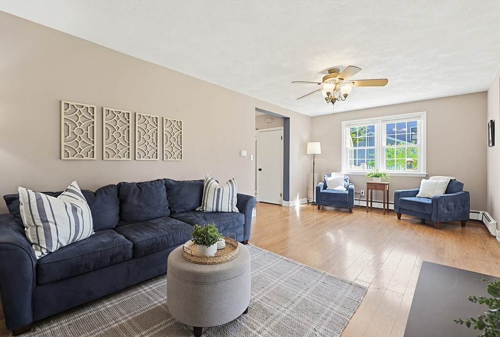 18 Anchorage Road Franklin, MA 02038 - Photo 4 of 42 a living room with furniture and wooden floor