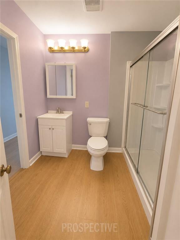 215 Maple Street Kittanning, PA 16201 - Photo 19 of 39 a bathroom with a toilet sink and mirror