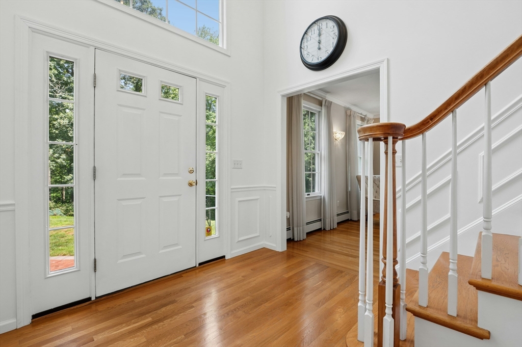 10 Burnett Road Southborough, MA 01772 - Photo 6 of 42 a view of an entryway with wooden floor