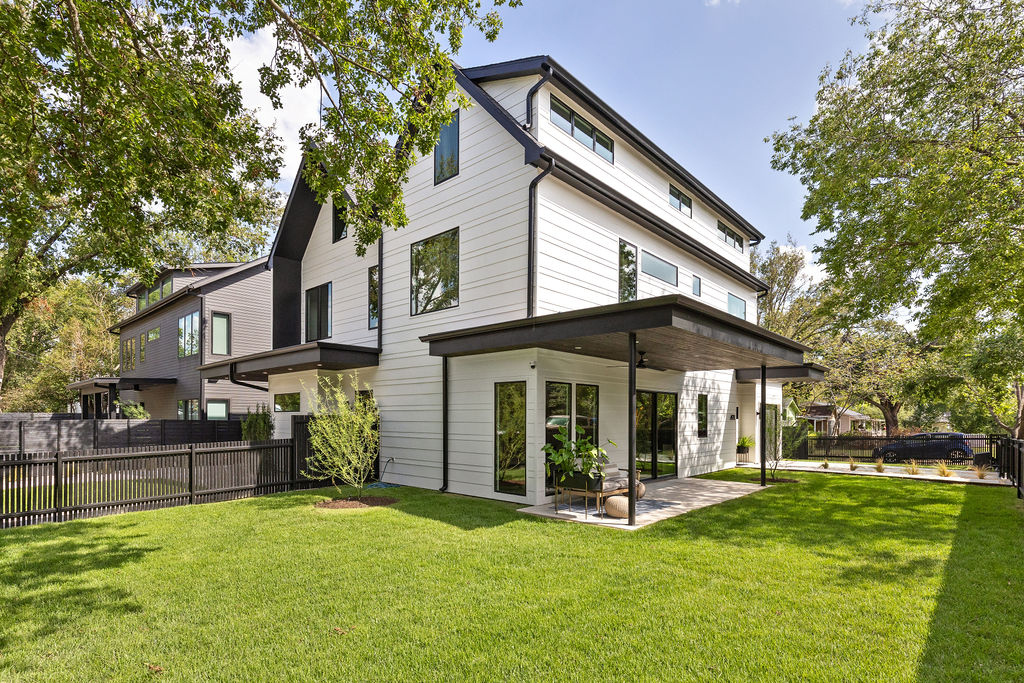 4911 Duval Street Austin, TX 78751 - Photo 24 of 33 a view of a house with a yard and sitting area