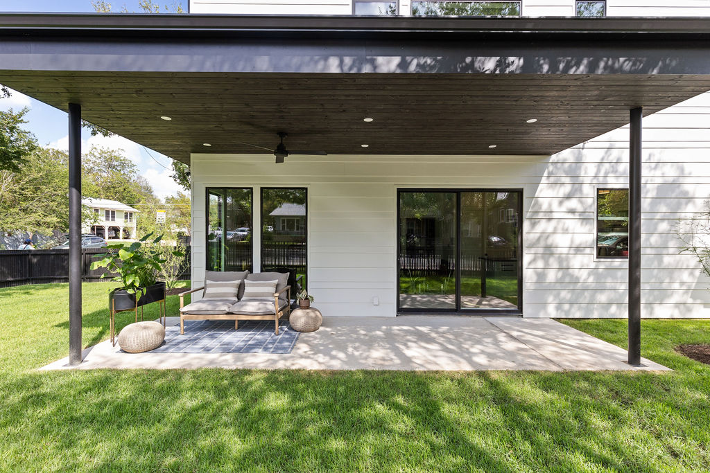 4911 Duval Street Austin, TX 78751 - Photo 27 of 33 a view of a house with backyard porch and sitting area