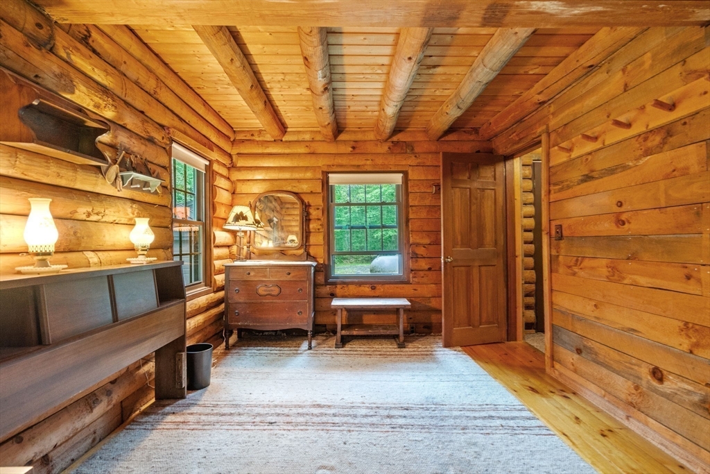 116 Skyline Trail Middlefield, MA 01235 - Photo 11 of 37 a bedroom with furniture and a window