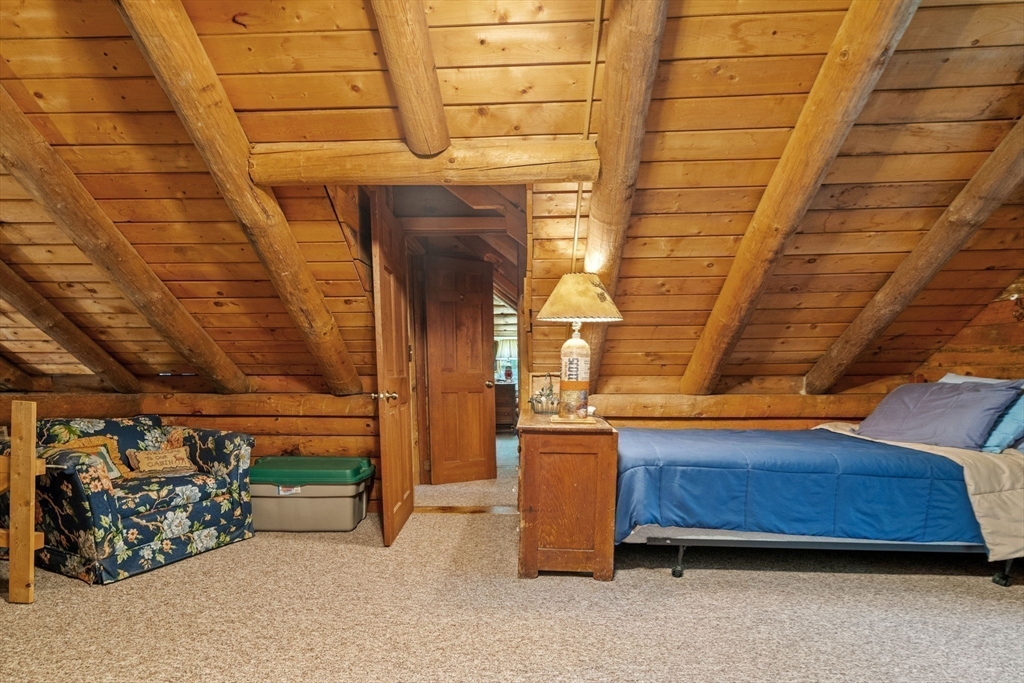 116 Skyline Trail Middlefield, MA 01235 - Photo 19 of 37 a view of a room with wooden walls