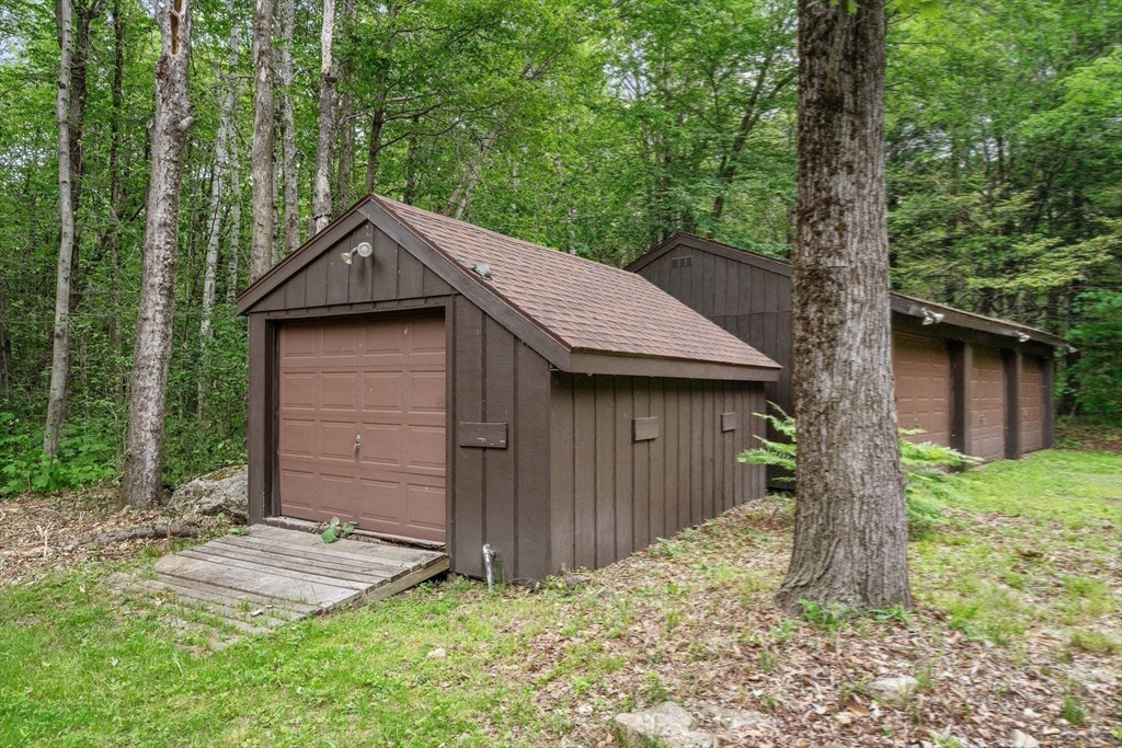 116 Skyline Trail Middlefield, MA 01235 - Photo 32 of 37 a house with trees in the background
