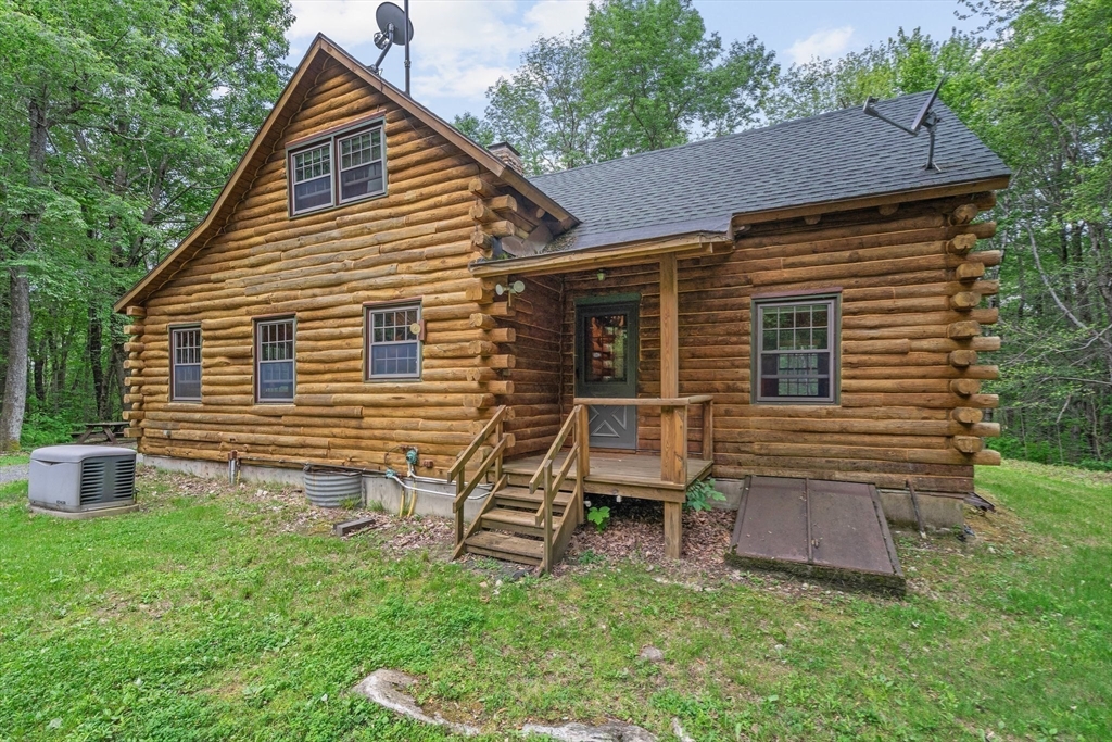 116 Skyline Trail Middlefield, MA 01235 - Photo 5 of 37 front view of a house with a yard