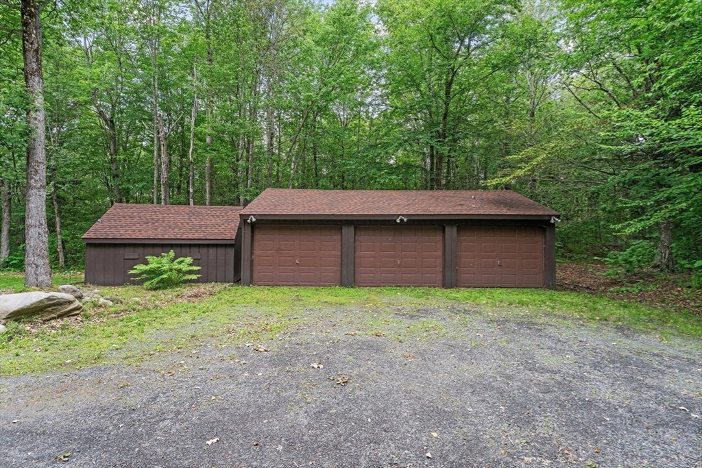 116 Skyline Trail Middlefield, MA 01235 - Photo 6 of 37 a backyard of a house with lots of green space