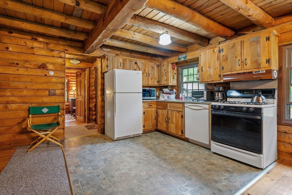 116 Skyline Trail Middlefield, MA 01235 - Photo 9 of 37 a view of a kitchen with appliances and cabinets