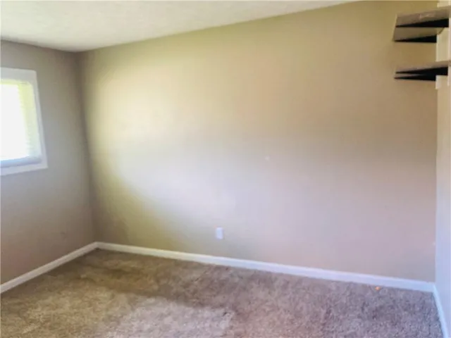 a view of a small space with a window