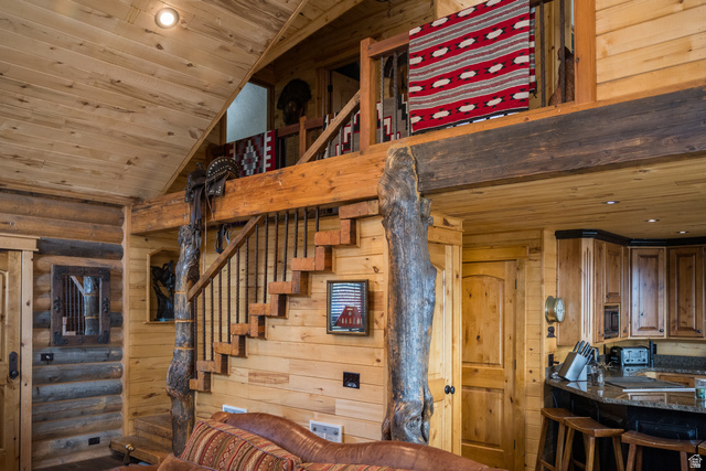 18906 North Canyon Road Whiterocks, UT 84085 - Photo 30 of 65 Stairs with wood ceiling, wooden walls, and recessed lighting