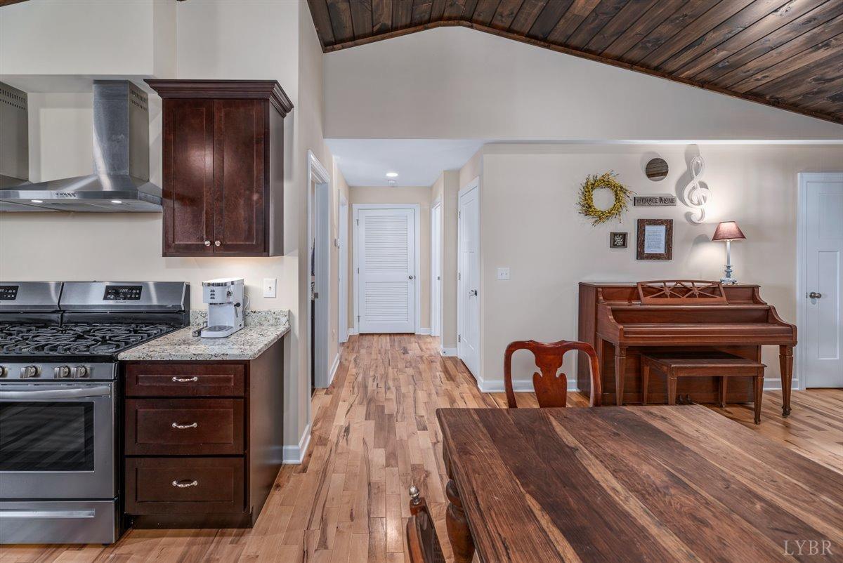 4625 Lowry Road Goode, VA 24556 - Photo 14 of 56 a view of kitchen with furniture and wooden floor