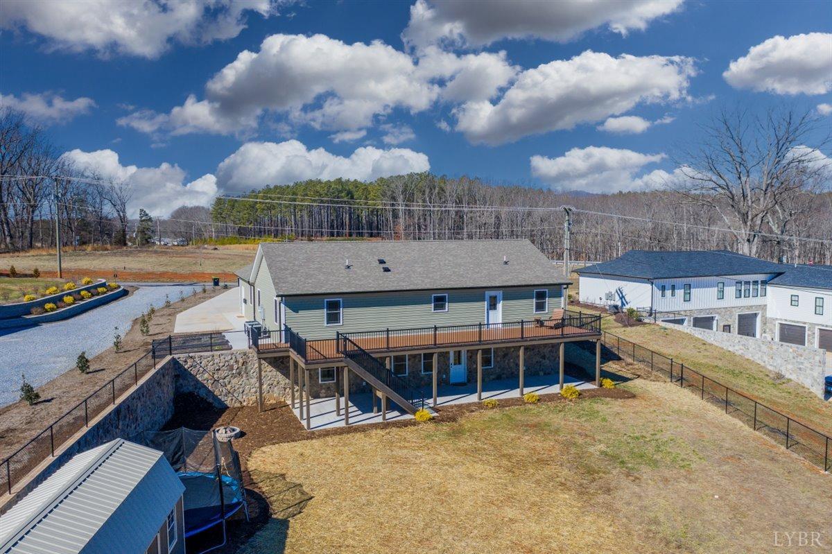 4625 Lowry Road Goode, VA 24556 - Photo 44 of 56 a view of a house with roof deck