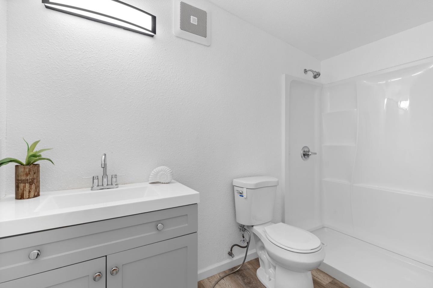 2245 Old Piedmont Road San Jose, CA 95132 - Photo 23 of 39 a bathroom with a sink toilet and shower