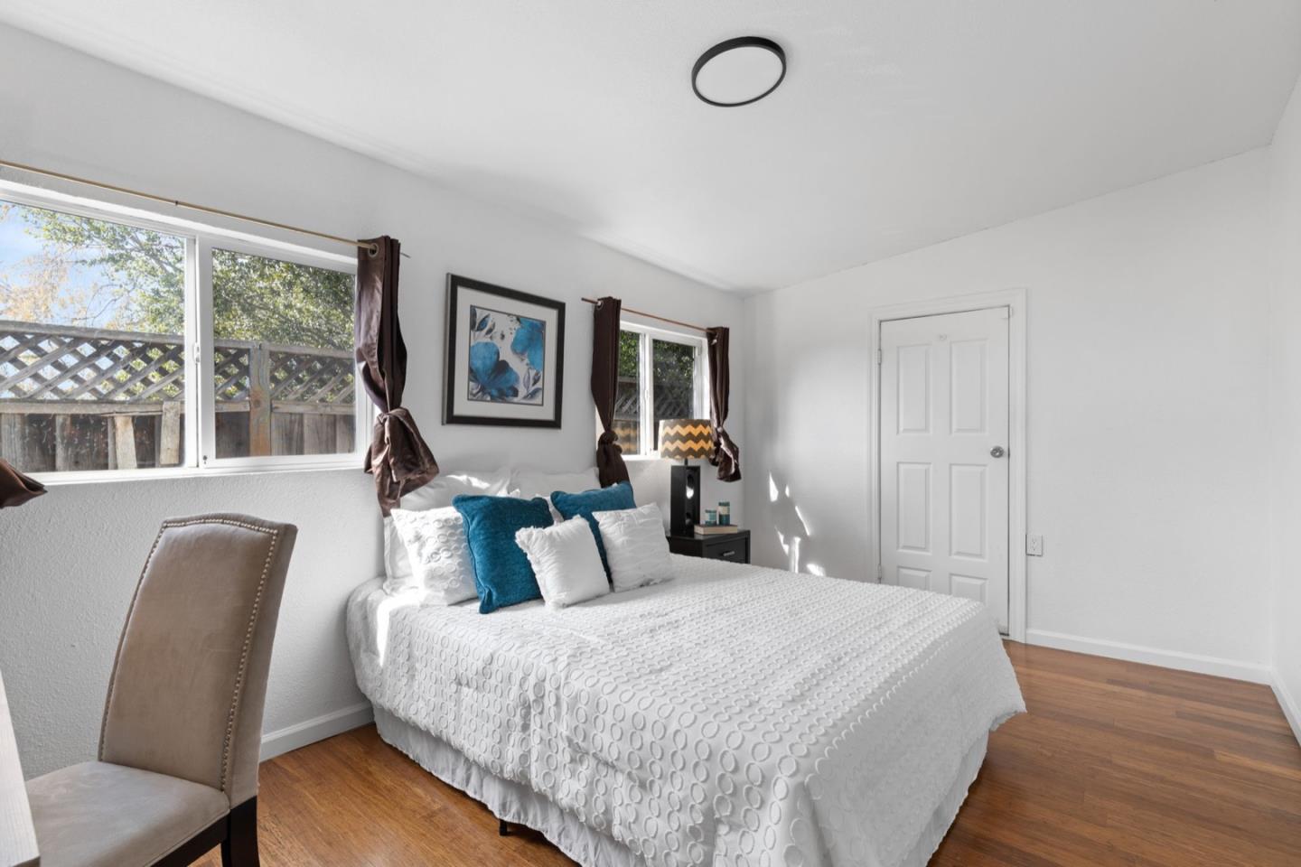 2245 Old Piedmont Road San Jose, CA 95132 - Photo 24 of 39 a bedroom with a large bed and a large window