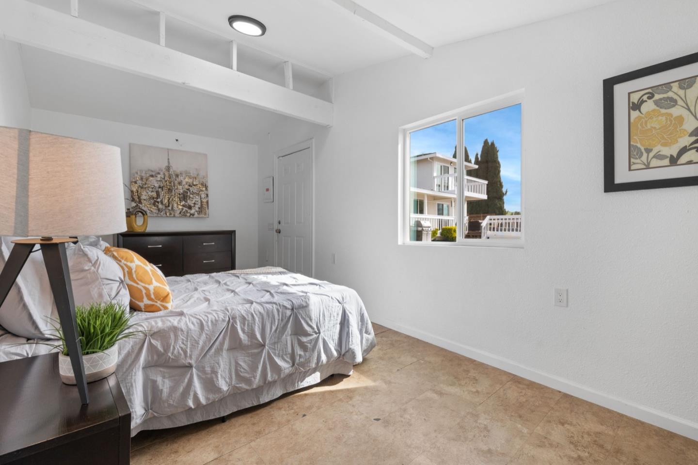 2245 Old Piedmont Road San Jose, CA 95132 - Photo 26 of 39 a bedroom with bed and wall painting