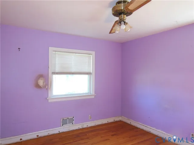 a view of a room that has a window in it