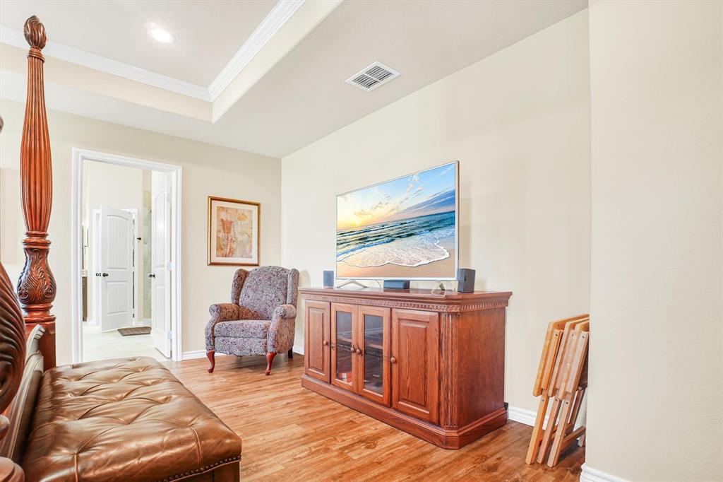 14095 Pecan Lane Forney, TX 75126 - Photo 15 of 34 a bedroom with furniture and a window
