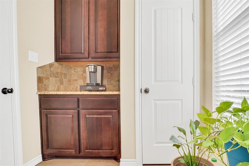 14095 Pecan Lane Forney, TX 75126 - Photo 9 of 34 a kitchen with a sink
