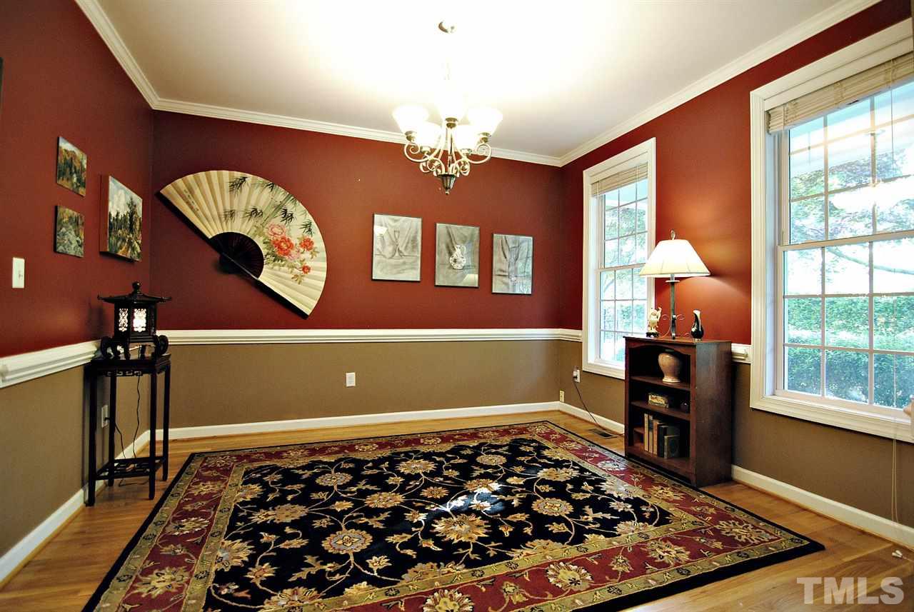 6924 Ray Road Raleigh, NC 27613 - Photo 11 of 22 a room with furniture and a window