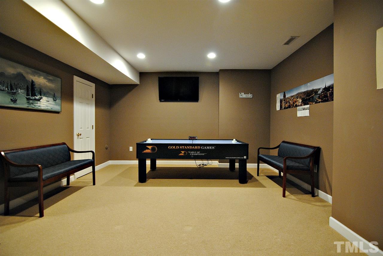 6924 Ray Road Raleigh, NC 27613 - Photo 18 of 22 a room with furniture