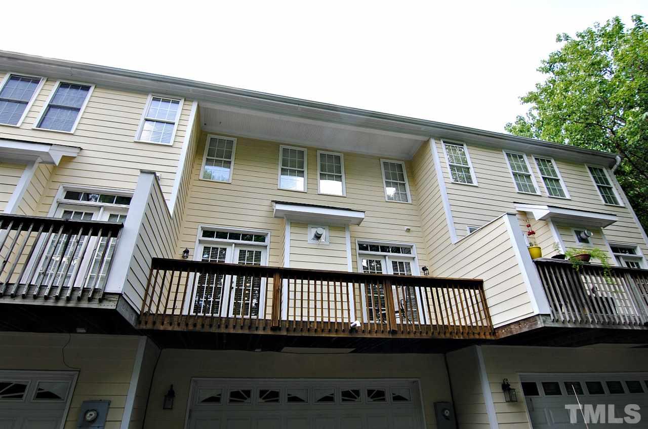 6924 Ray Road Raleigh, NC 27613 - Photo 21 of 22 a view of a house with a deck