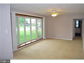 595 West County Line Road Hatboro, PA 19040 - Photo 4 of 11 a view of an empty room with a window