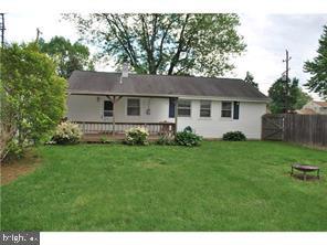 595 West County Line Road Hatboro, PA 19040 - Photo 9 of 11 a front view of house with yard and green space